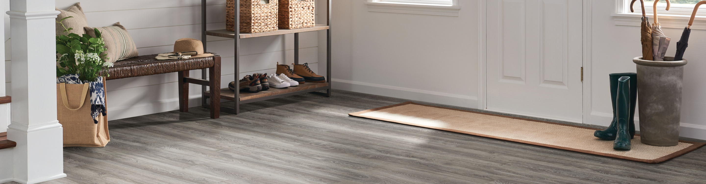 gray vinyl plank floor in entryway